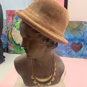 Cream pinkish velvet hat in great condition one size fits all.